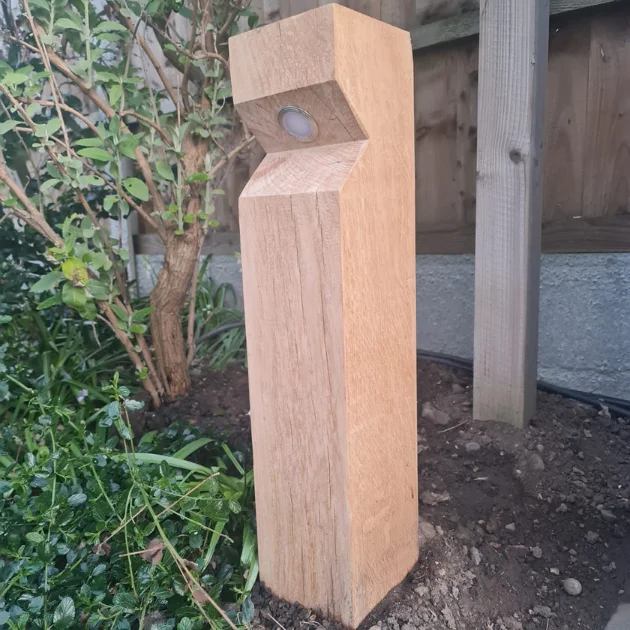 image of the stratton single wooden bollard light with leds in situ - oak wood